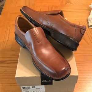 Clarks size 12 brown leather slip on shoes